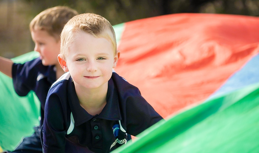 boy on-jumbo-parachuteat early learning center