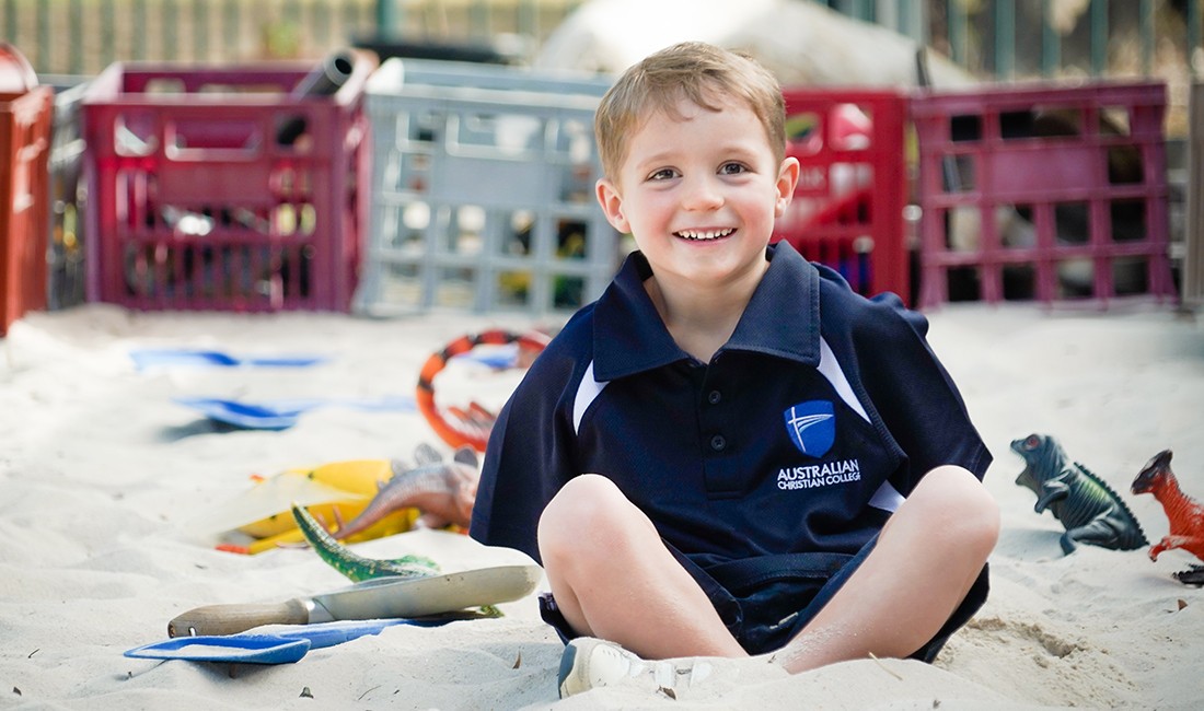 happy child-in-sandpitat early learning center